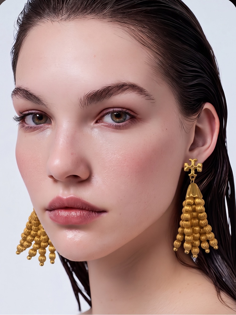 NWT TORI BURCH ROXANNE ROLLED BRASS TASSEL GOLD EARRINGS.